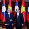 Tổng Bí thư Tô Lâm hội kiến Thủ tướng Chính phủ Lào Sonexay Siphandone. (Ảnh: Thống Nhất/TTXVN)