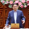 Thủ tướng Phạm Minh Chính chủ trì họp khắc phục hậu quả thiên tai sau bão. (Ảnh: Dương Giang/TTXVN)