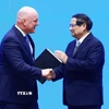 Thủ tướng Phạm Minh Chính và Thủ tướng New Zealand Christopher Luxon tuyên bố nâng cấp quan hệ Việt Nam- New Zealand lên Đối tác Chiến lược toàn diện. (Ảnh: Dương Giang/TTXVN)