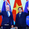 Thủ tướng Phạm Minh Chính và Thủ tướng New Zealand Christopher Luxon hội đàm. (Ảnh: Dương Giang/TTXVN)