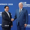 Hoàng thân Monaco Albert II đón Thủ tướng Phạm Minh Chính tham dự Hội nghị Đại dương của Liên hợp quốc lần thứ 3. (Ảnh: Dương Giang/TTXVN)