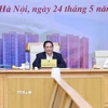 Thủ tướng Phạm Minh Chính chủ trì cuộc làm việc về tình hình thị trường vàng. (Ảnh: Dương Giang/TTXVN)