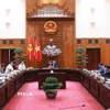 Thủ tướng Phạm Minh Chính chủ trì cuộc họp về đảm bảo cân bằng thương mại với Hoa Kỳ. (Ảnh: Dương Giang/TTXVN)