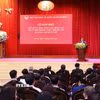 Phó Giáo sư, tiến sỹ Đoàn Minh Huấn, Ủy viên Bộ Chính trị, Giám đốc Học viện Chính trị quốc gia Hồ Chí Minh phát biểu khai mạc. (Ảnh: Văn Điệp/TTXVN)