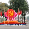 Biểu tượng búa liềm, cờ Đảng, cờ Tổ quốc được bố trí trang trọng tại nút giao Điện Biên Phủ-Độc Lập-Chu Văn An, chào mừng Đại hội đại biểu toàn quốc lần thứ XIV của Đảng. (Ảnh: Vũ Quang/TTXVN)