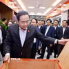 Chủ tịch Quốc hội Trần Thanh Mẫn kiểm tra, giám sát công tác chuẩn bị bầu cử tại khu vực bỏ phiếu số 8, phường Hải An, thành phố Hải Phòng. (Ảnh: Doãn Tấn/TTXVN)