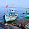 Cán bộ Trạm Biên phòng cửa khẩu cảng Dương Đông (Bộ đội Biên phòng Kiên Giang) thực hiện nhiệm vụ kiểm tra tàu cá ra vào cửa sông Dương Đông, thành phố Phú Quốc. (Ảnh: Lê Huy Hải/TTXVN)