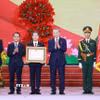 Tổng Bí thư Tô Lâm trao Huân chương Lao động hạng Nhất cho Đảng bộ, chính quyền và nhân dân Thành phố Đà Nẵng. (Ảnh: Thống Nhất/TTXVN)
