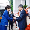 Thủ tướng Lê Minh Hưng đón Thủ tướng Nhật Bản Takaichi Sanae. (Ảnh: Dương Giang/TTXVN)