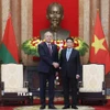 Chủ tịch nước Lương Cường tiếp Chủ tịch Hạ viện Cộng hòa Belarus Igor Sergeenko. (Ảnh: Lâm Khánh/TTXVN)