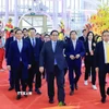 Thủ tướng Phạm Minh Chính đến dự Lễ khai mạc Hội chợ Mùa Xuân lần thứ nhất năm 2026. (Ảnh: Dương Giang/TTXVN)
