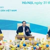 Thủ tướng Phạm Minh Chính đối thoại với nông dân. (Ảnh: Dương Giang/TTXVN)