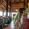 Lực lượng Thanh niên xung phong Thành phố Hồ Chí Minh dành một phút mặc niệm, tưởng nhớ 99 liệt sỹ thanh niên xung phong Thành phố đã anh dũng hy sinh trong chiến tranh bảo vệ biên giới Tây Nam. (Ảnh: Giang Phương/TTXVN)