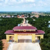 Quốc môn Cửa khẩu quốc tế Tân Nam đối diện Cửa khẩu quốc tế Meun Chay (tỉnh Prey Veng, Vương quốc Campuchia) vừa được khai trương. (Ảnh: Minh Phú/TTXXN)