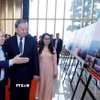 Tổng Bí thư Tô Lâm tham quan Trưng bày ảnh các hoạt động tiêu biểu của ngành Tuyên giáo và Dân vận năm 2025, do Thông tấn xã Việt Nam thực hiện. (Ảnh: Phương Hoa/TTXVN)