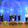 Thủ tướng Phạm Minh Chính và các đại biểu khai trương Cổng pháp luật quốc gia. (Ảnh: Dương Giang/TTXVN)