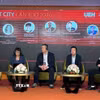Phiên tọa đàm với chủ đề: "Định hình chiến lược phát triển đô thị thông minh thành phố Cần Thơ". (Ảnh: Nguyễn Văn Việt/TTXVN)