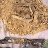 Hài cốt liệt sỹ được phát hiện tại xã Hiếu Giang, tỉnh Quảng Trị. (Ảnh: TTXVN phát)
