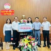 Ủy ban Mặt trận Tổ quốc Việt Nam thành phố Đà Nẵng tiếp nhận ủng hộ 5 tỷ đồng từ doanh nghiệp để hỗ trợ công tác ứng phó, khắc phục hậu quả do mưa lũ gây ra. (Ảnh: Khoa Chương/TTXVN)