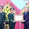 Tổng Bí thư Tô Lâm trao Huân chương Hồ Chí Minh cho lực lượng Tình báo Quốc phòng Việt Nam. (Ảnh: Thống Nhất/TTXVN)