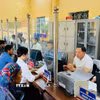 Mức độ hài lòng của người dân và doanh nghiệp tại xã Púng Luông (Lào Cai) ngày càng được nâng lên đạt 99,6%. (Ảnh: Tuấn Anh/ TTXVN)