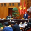 Thủ tướng Phạm Minh Chính làm việc với lãnh đạo Bộ Quốc phòng về phát triển công nghiệp quốc phòng. (Ảnh: Dương Giang/TTXVN)