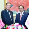 Trong chuyến tham dự Hội nghị Cấp cao ASEAN lần thứ 44, 45 và các hội nghị cấp cao liên quan tại Vientiane (Lào), sáng 11/10/2024, Thủ tướng Phạm Minh Chính gặp Thủ tướng Nhật Bản Ishiba Shigeru. (Ảnh: Dương Giang/TTXVN)