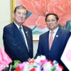 Trong chuyến tham dự Hội nghị Cấp cao ASEAN lần thứ 44, 45 và các hội nghị cấp cao liên quan tại Vientiane (Lào), sáng 11/10/2024, Thủ tướng Phạm Minh Chính gặp Thủ tướng Nhật Bản Ishiba Shigeru. (Ảnh: Dương Giang/TTXVN)