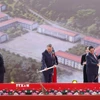 Tổng Bí thư Tô Lâm, Thủ tướng Phạm Minh Chính và các đại biểu thực hiện nghi thức khởi công, động thổ đồng loạt các trường nội trú liên cấp biên giới. (Ảnh: Thống Nhất/TTXVN)