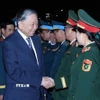Tổng Bí thư Tô Lâm với lãnh đạo Bộ Quốc phòng và Quân chủng Phòng không-Không quân. (Ảnh: Thống Nhất/TTXVN)
