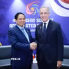 Thủ tướng Phạm Minh Chính gặp Thủ tướng Canada Mark Carney. (Ảnh: Dương Giang/TTXVN)