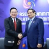 Thủ tướng Phạm Minh Chính gặp Tổng Thư ký ASEAN Kao Kim Hourn. (Ảnh: Dương Giang/TTXVN)