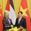 Chủ tịch nước Lương Cường và Quốc vương Jordan Abdullah II Ibn Al Hussein chụp ảnh chung trước hội đàm. (Ảnh: Lâm Khánh/TTXVN)