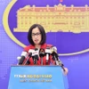 Người phát ngôn Bộ Ngoại giao Phạm Thu Hằng trả lời câu hỏi của các cơ quan báo chí trong nước và quốc tế. (Ảnh: Minh Đức/TTXVN)