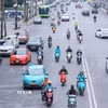Xe điện với nhiều ưu điểm, tiện lợi nên ngày càng hiện diện nhiều trong đời sống hàng ngày của người dân. (Ảnh: Hoàng Hiếu/TTXVN)
