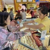 Giao dịch vàng. (Ảnh: Hứa Chung/TTXVN)