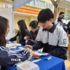 Nhiều học sinh đã nhận thức được ý nghĩa quan trọng của việc lựa chọn nghề nghiệp cho tương lai qua hoạt động hướng nghiệp. (Ảnh: Nguyễn Cúc/TTXVN)