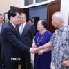 Chủ tịch nước Lương Cường với đại diện gia đình nhân sĩ hữu nghị - tướng lĩnh cách mạng, chuyên gia, cố vấn Trung Quốc từng tham gia giúp đỡ Việt Nam. (Ảnh: Lâm Khánh/TTXVN)