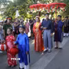 Tái hiện đám rước Công nữ Ngọc Hoa và thương nhân Araki Sotaro tại Chương trình Giao lưu văn hóa Hội An-Nhật Bản lần thứ 20 năm 2024. (Ảnh: Trịnh Bang Nhiệm/TTXVN)
