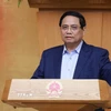 Thủ tướng Phạm Minh Chính chủ trì Phiên họp Chính phủ chuyên đề về Trung tâm Tài chính quốc tế tại Việt Nam. (Ảnh: Dương Giang/TTXVN)