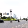 Tình hình giao thông tại khu vực vòng xoay Nguyễn Bỉnh Khiêm được cải thiện rõ rệt, các phương tiện di chuyển thông suốt sau gần 2 tháng triển khai điều chỉnh. (Ảnh: Tiến Lực/TTXVN)