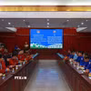 Quang cảnh buổi làm việc giữa Đoàn thanh niên tình nguyện hè Thành phố Hồ Chí Minh và Tỉnh đoàn Champasak. (Ảnh: TTXVN phát)
