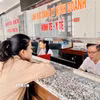 Người dân đến làm các thủ tục tại Trung tâm phục vụ hành chính công phường Quảng Trị (tỉnh Quảng Trị). (Ảnh: Nguyên Linh/TTXVN)
