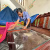 Dù đã khóa kín cửa nhưng bụi vẫn bám đầy trong nhà anh Nguyễn Thanh Liêm ở thôn Minh Tân Bắc, xã Mỏ Cày, tỉnh Quảng Ngãi. (Ảnh: Cao Nguyên/TTXVN)