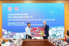Lễ ghi nhận của cộng đồng quốc tế cho người dân Việt Nam sau bão Bualoi và Matmo.