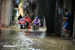 Ngập úng đô thị. (Nguồn ảnh: Vietnam+)