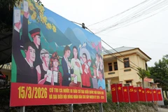 Cờ hoa và băngrôn khẩu hiệu tuyên truyền về bầu cử. (Nguồn: TTXVN)