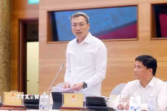 Thiếu tướng Nguyễn Quốc Toản, Chánh Văn phòng, Người phát ngôn Bộ Công an trả lời câu hỏi của phóng viên các cơ quan thông tấn, báo chí. (Ảnh: Phạm Kiên/TTXVN)