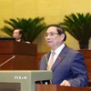 Thủ tướng Phạm Minh Chính trình bày Báo cáo của Chính phủ. (Ảnh: Phương Hoa/TTXVN)