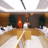 Thủ tướng Lê Minh Hưng chủ trì cuộc họp về cắt giảm thủ tục hành chính, điều kiện kinh doanh. (Ảnh: Dương Giang/TTXVN)